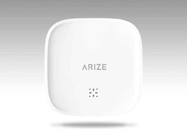 Text: The 2nd-generation Arize Smart Water Leak Detector from above.
